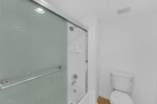 a view of a room with shelf on the wall