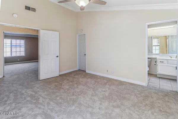 an empty room with a bathroom