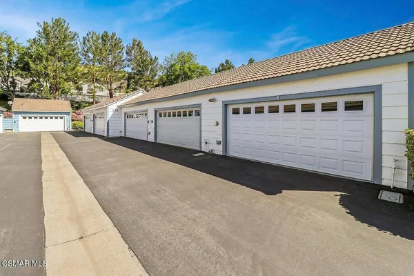 a front view of a house with a garage