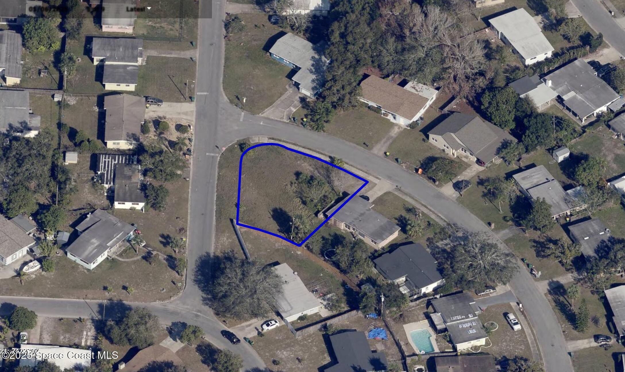 an aerial view of multiple houses with outdoor space