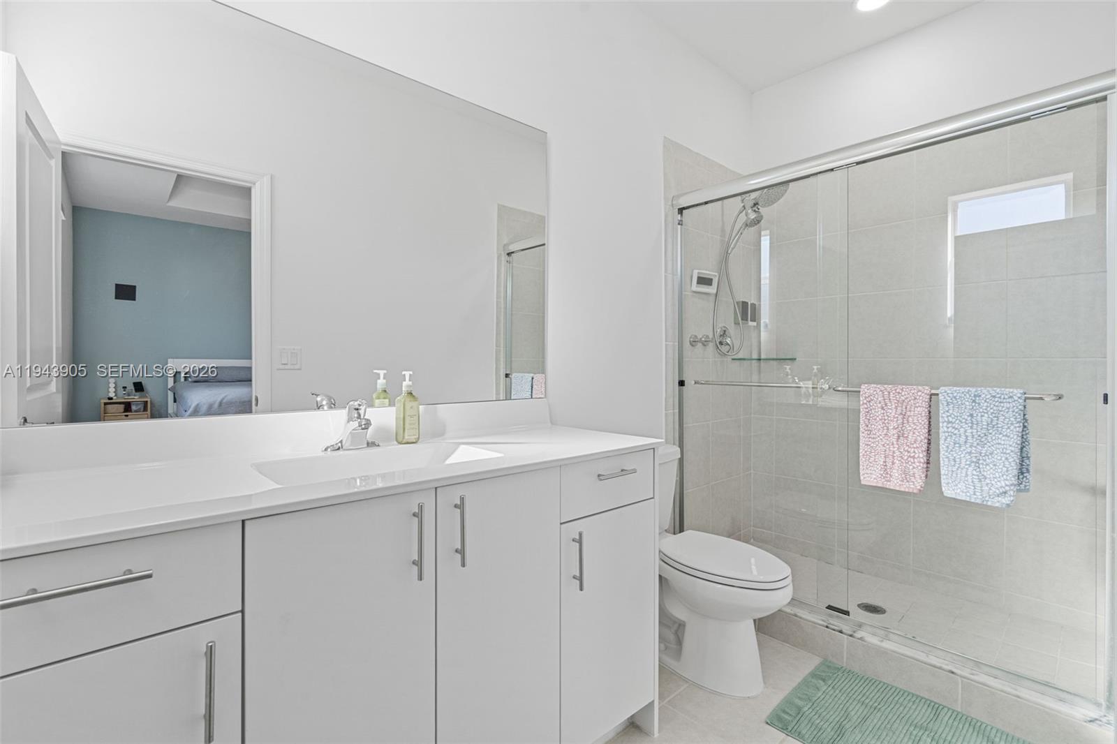16276 Southwest 291st Street Homestead, FL 33033 - Photo 13 of 22 a bathroom with a sink a toilet and shower