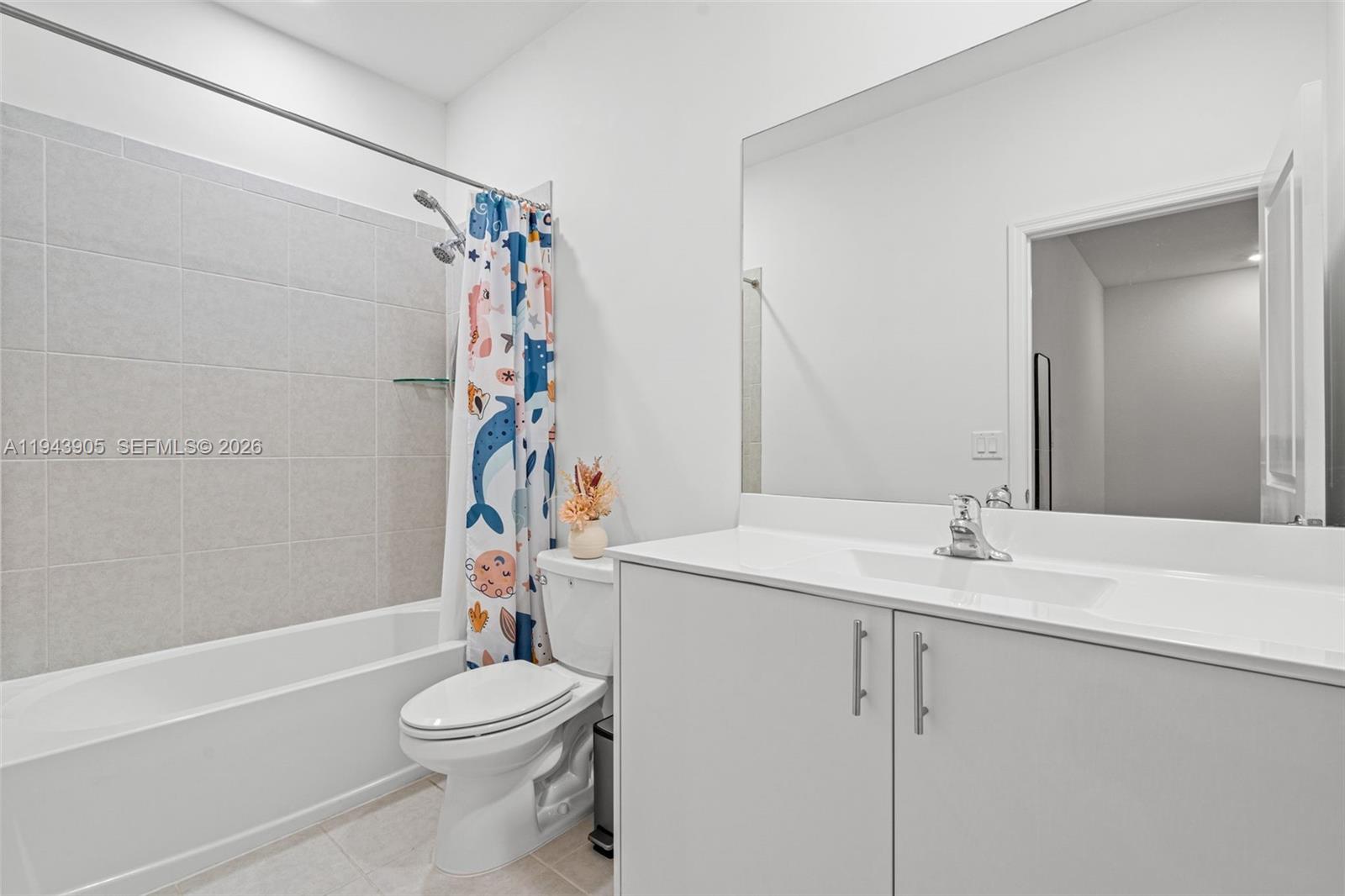 16276 Southwest 291st Street Homestead, FL 33033 - Photo 17 of 22 a bathroom with a sink a toilet and shower