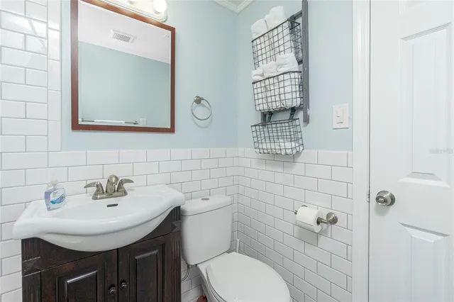 a view of a house with swimming pool and a yard