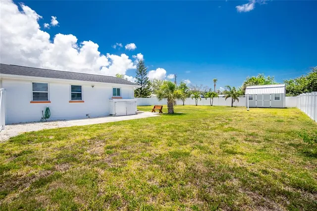 a view of back yard of the house