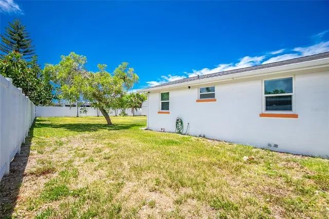 a view of outdoor space and a yard