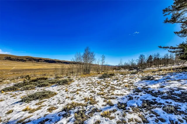 a view of a ocean with sunset