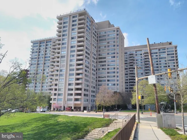 a view of a building with a yard