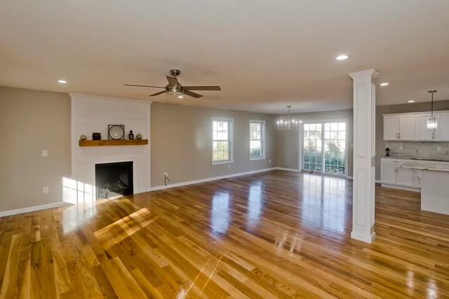 a view of a living room a fireplace with wooden floor