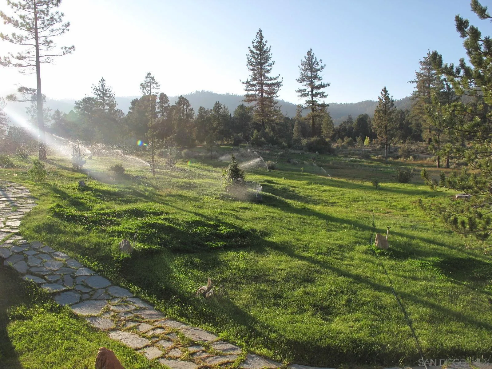 32890 Seymour Canyon Road Frazier Park, CA 93225 - Photo 15 of 17 a backyard of a house with lots of green space