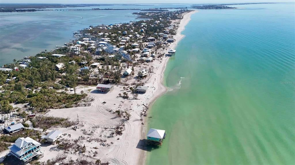 8168 Little Gasparilla Boca Grande, FL 33921 - Photo 22 of 22 a aerial view of a house with a yard
