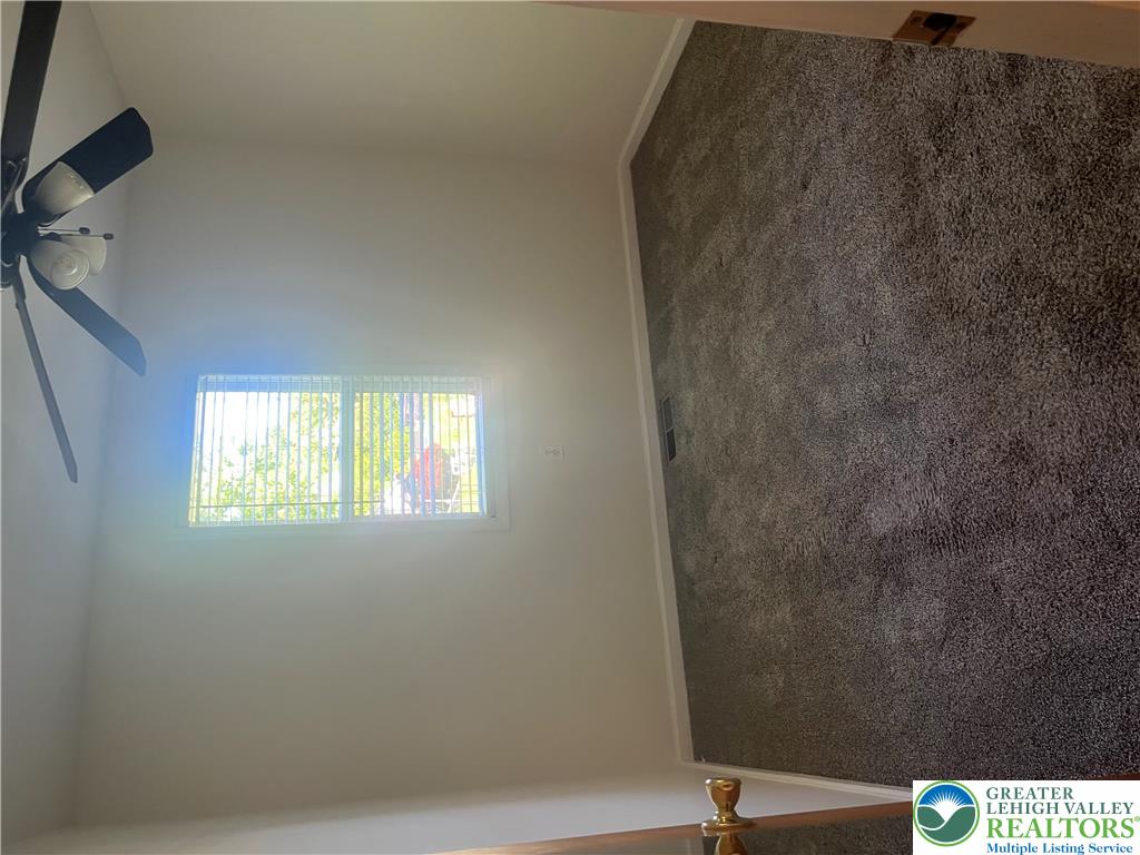 1839 Willow Park Road Bethlehem, PA 18020 - Photo 12 of 35 Natural light streams into this generously sized room, complemented by a convenient ceiling fan.