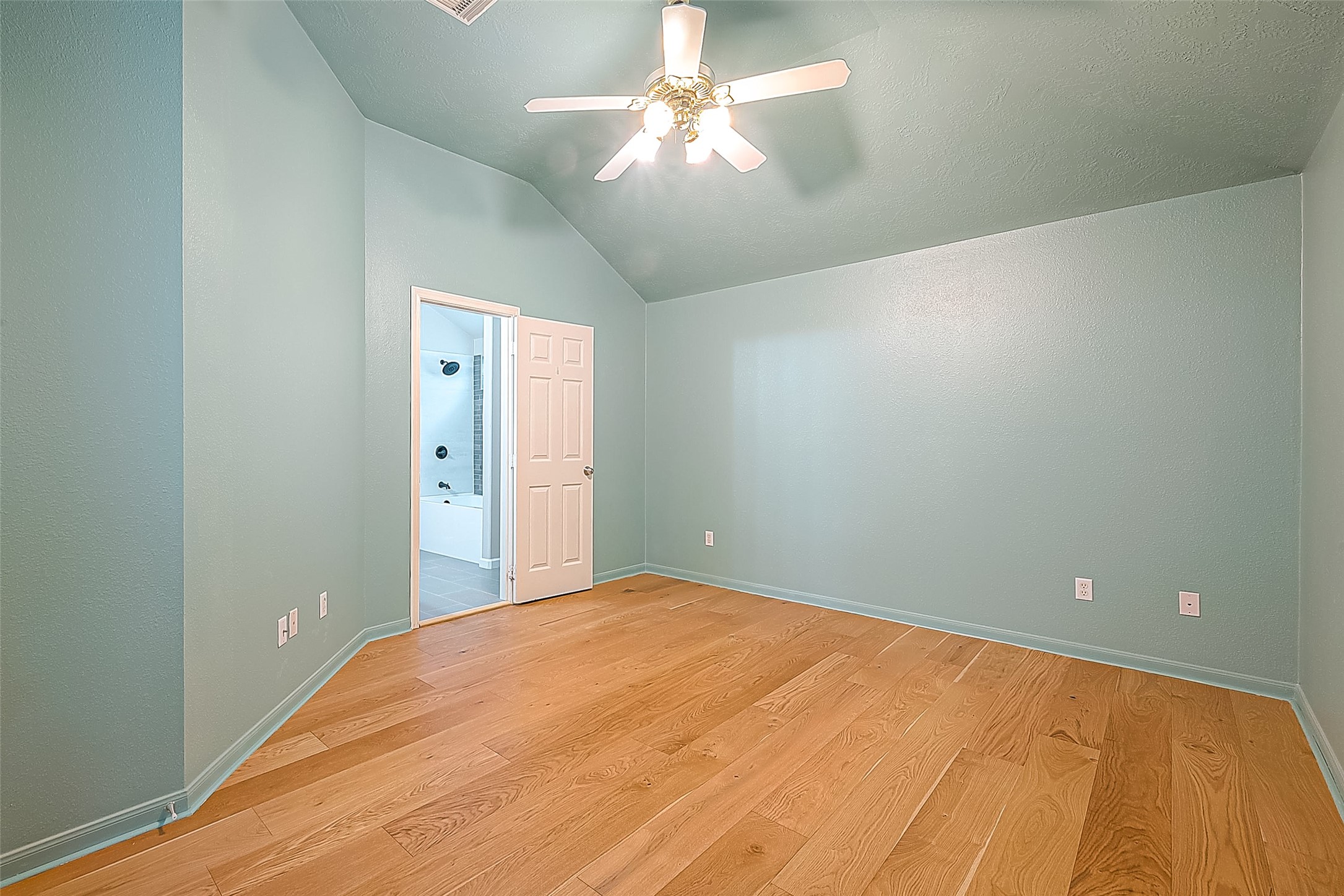 2910 Crescent Bend Road Spring, TX 77388 - Photo 19 of 30 a view of a big room with windows and chandelier fan