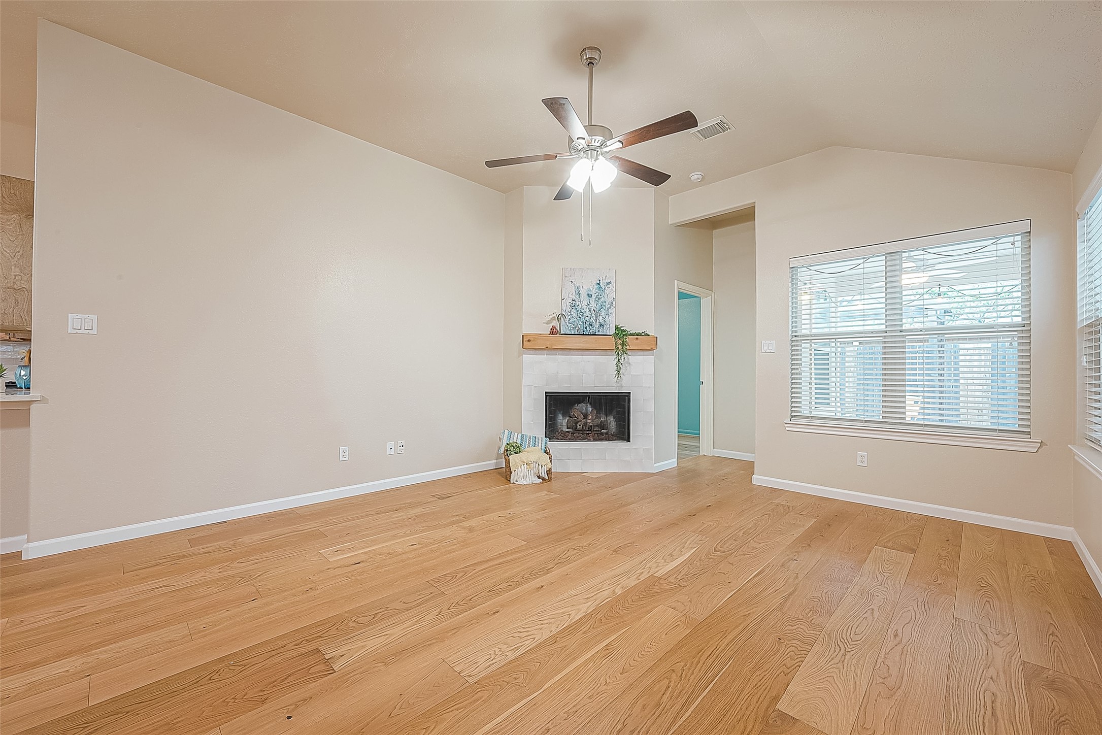 2910 Crescent Bend Road Spring, TX 77388 - Photo 10 of 30 a view of empty room with wooden floor and fan