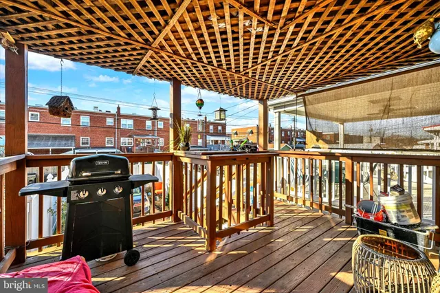 a view of a balcony with chairs