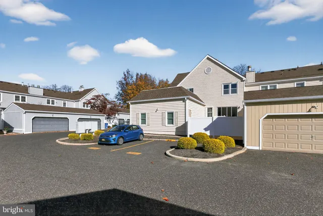 a view of the house with outdoor space and sitting area
