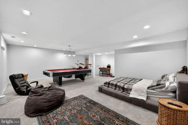 a living room with furniture and a couch