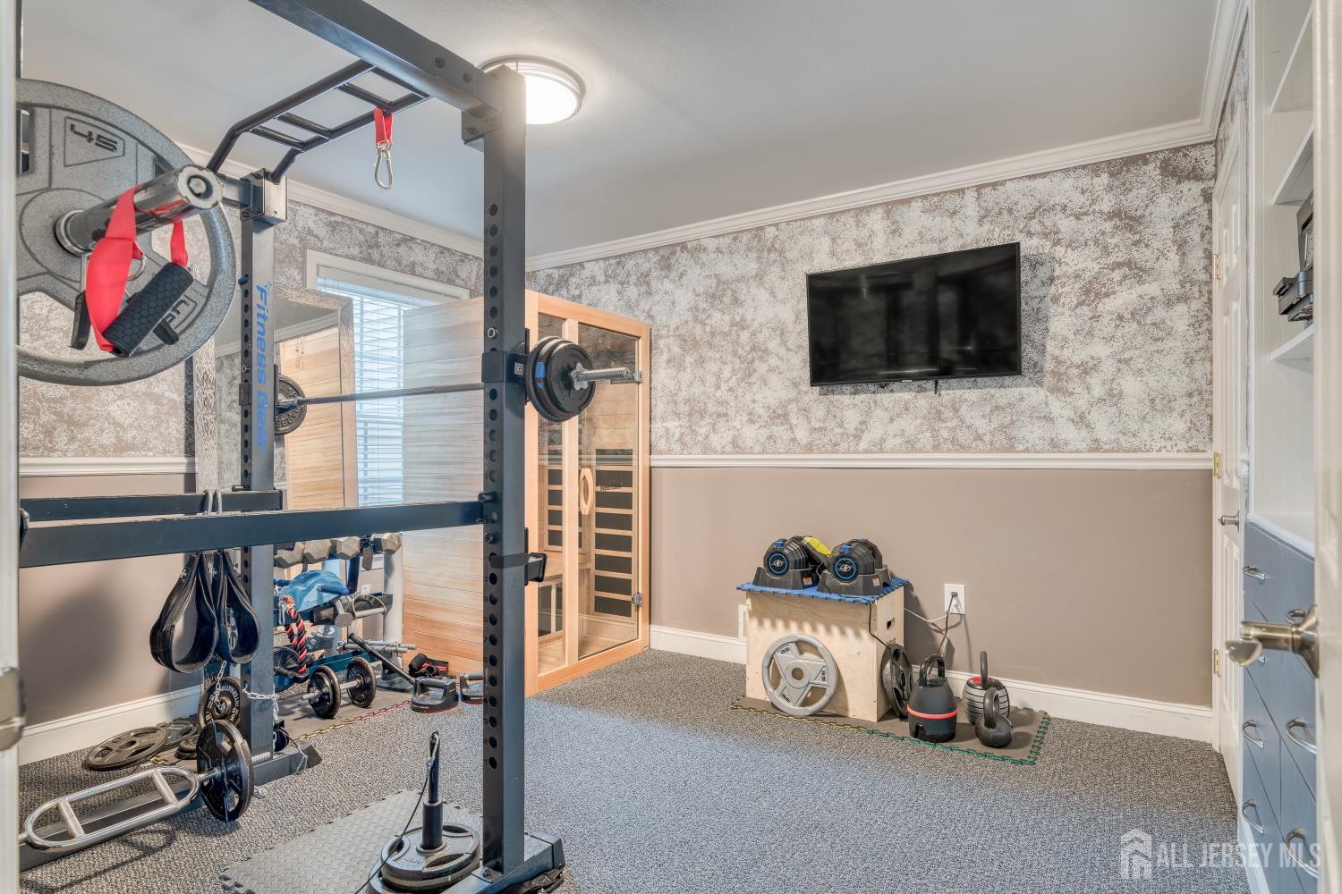 105 Neilly Court Old Bridge, NJ 08857 - Photo 15 of 24 a view of a room with gym equipment