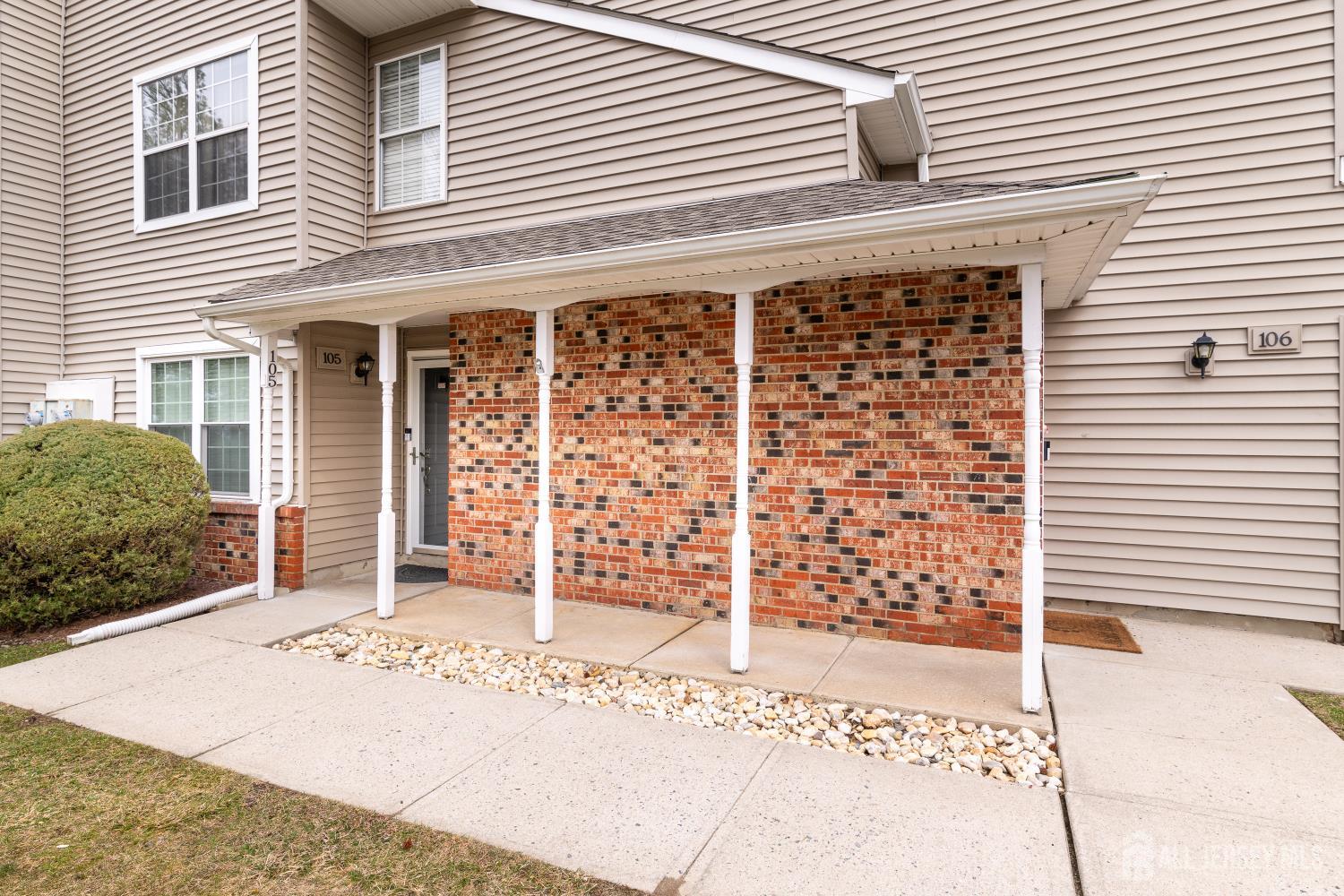 105 Neilly Court Old Bridge, NJ 08857 - Photo 2 of 24 a front view of a house