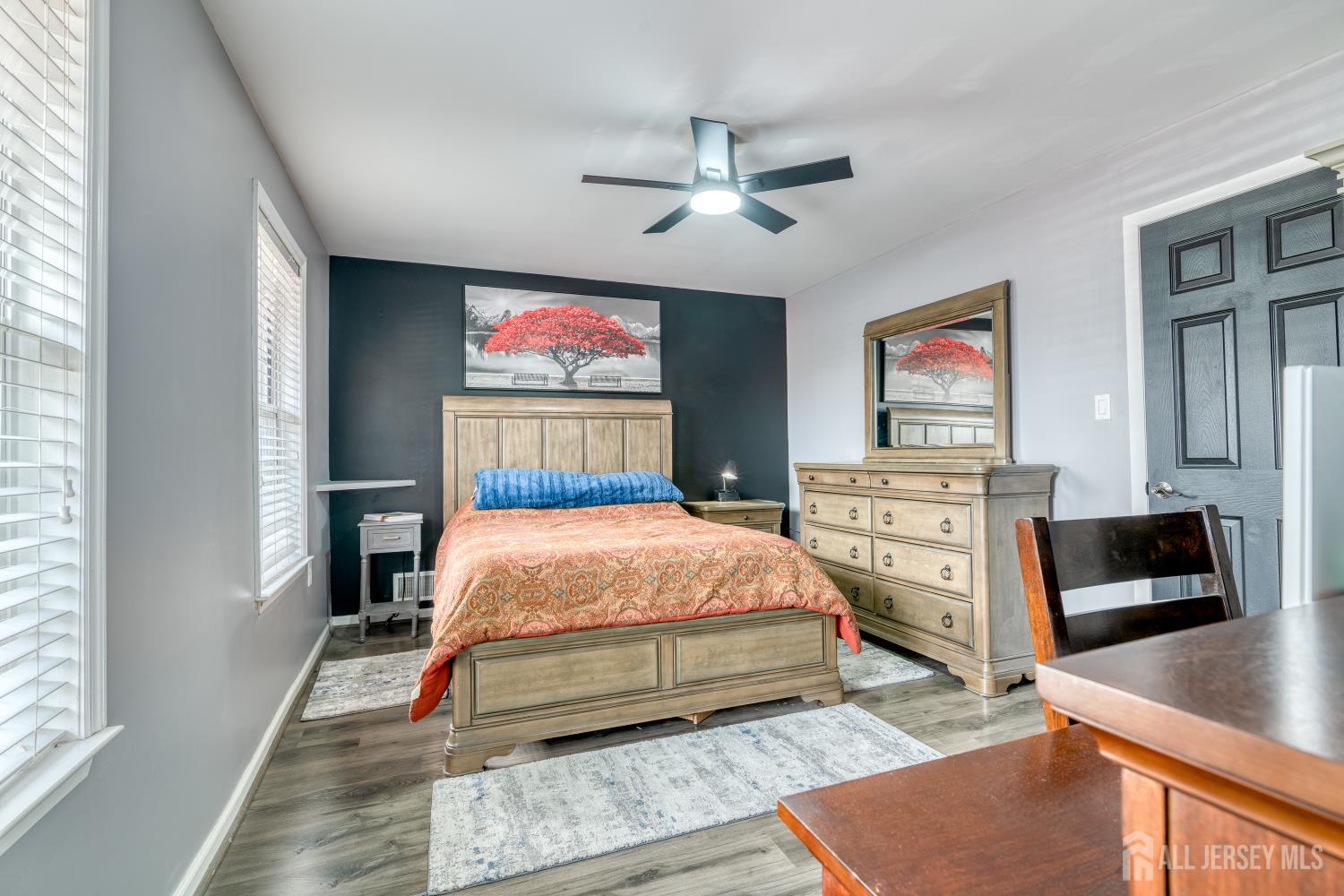105 Neilly Court Old Bridge, NJ 08857 - Photo 10 of 24 a bedroom with a bed and dresser
