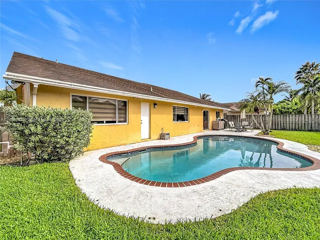 a view of outdoor space yard swimming pool and patio