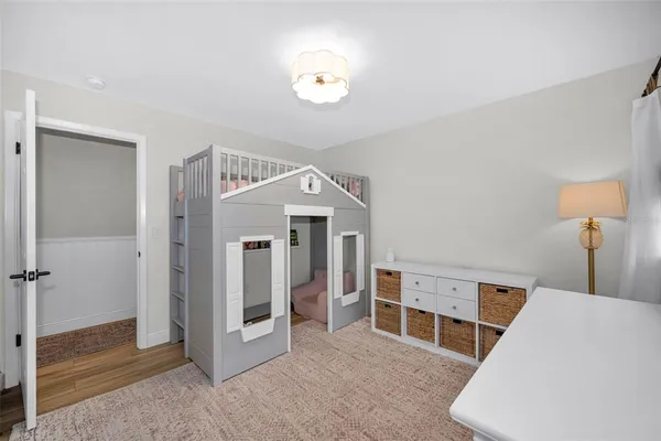 a view of a hallway with workspace and entryway