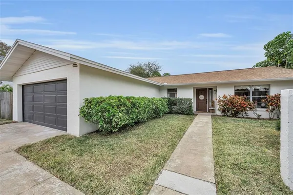 front view of a house with a yard