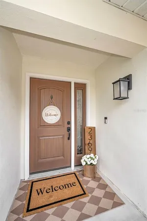 a view of a hallway with front door