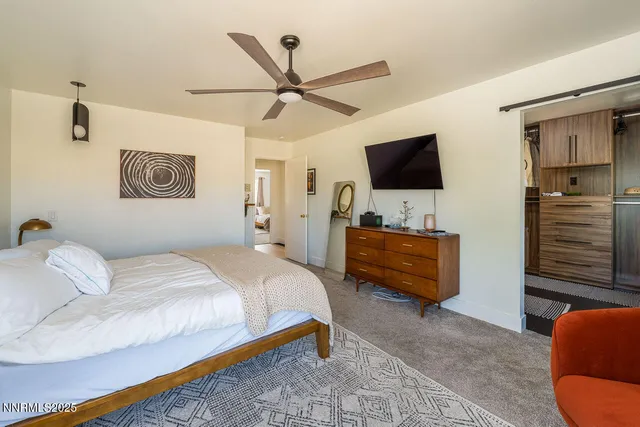 a kitchen with stainless steel appliances a refrigerator and cabinets