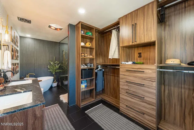 a reading room with furniture and a window