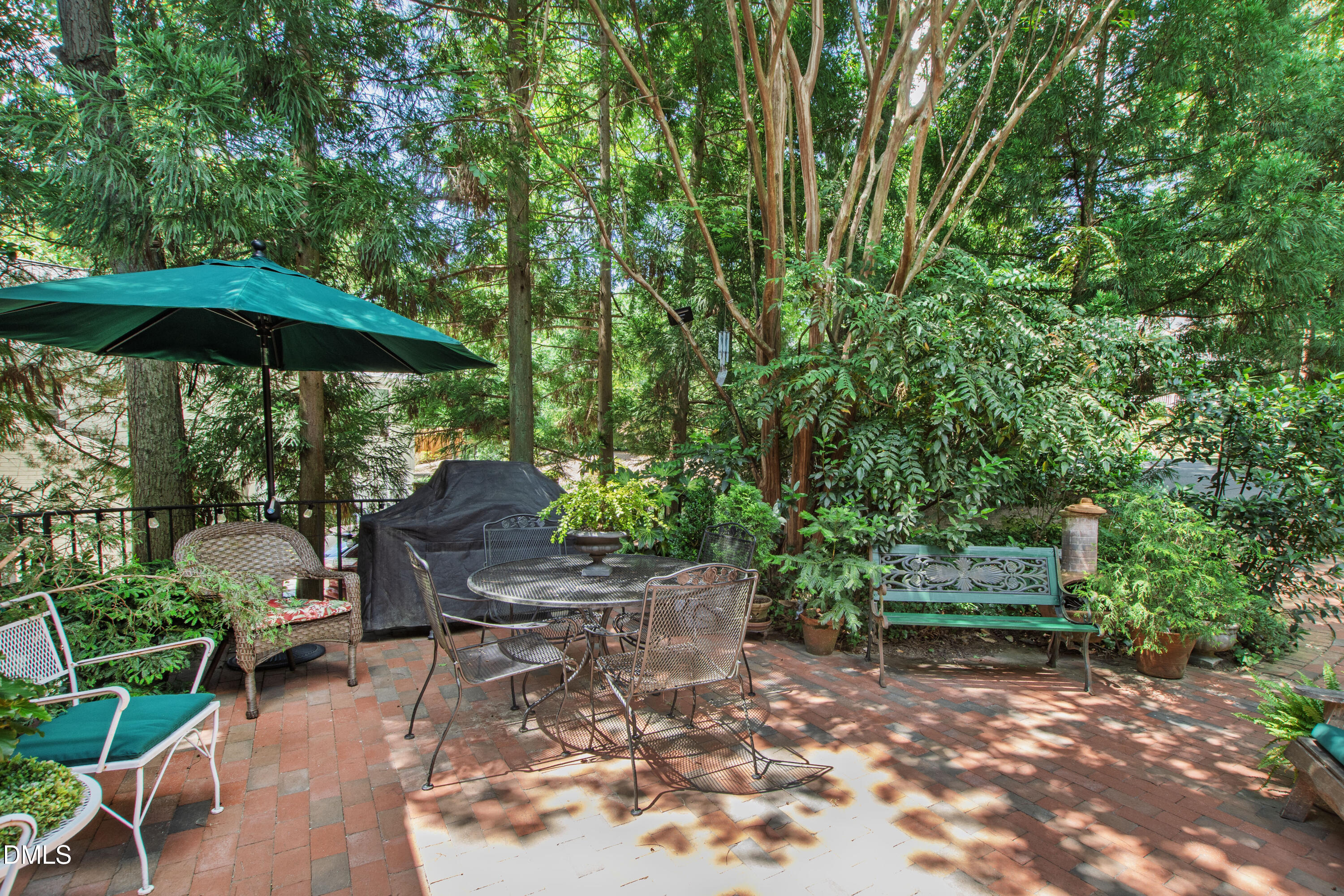 3708 Lubbock Drive Raleigh, NC 27612 - Photo 56 of 64 a garden view with a seating space