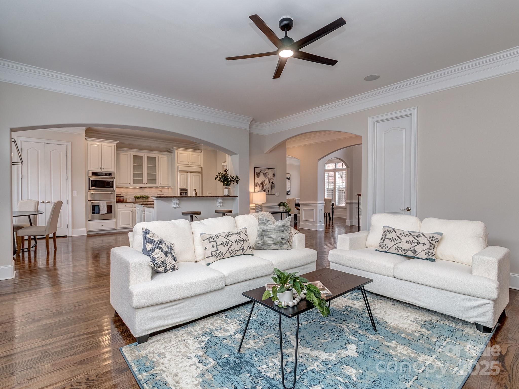8208 Wingard Road Waxhaw, NC 28173 - Photo 13 of 41 a living room with furniture and view of kitchen
