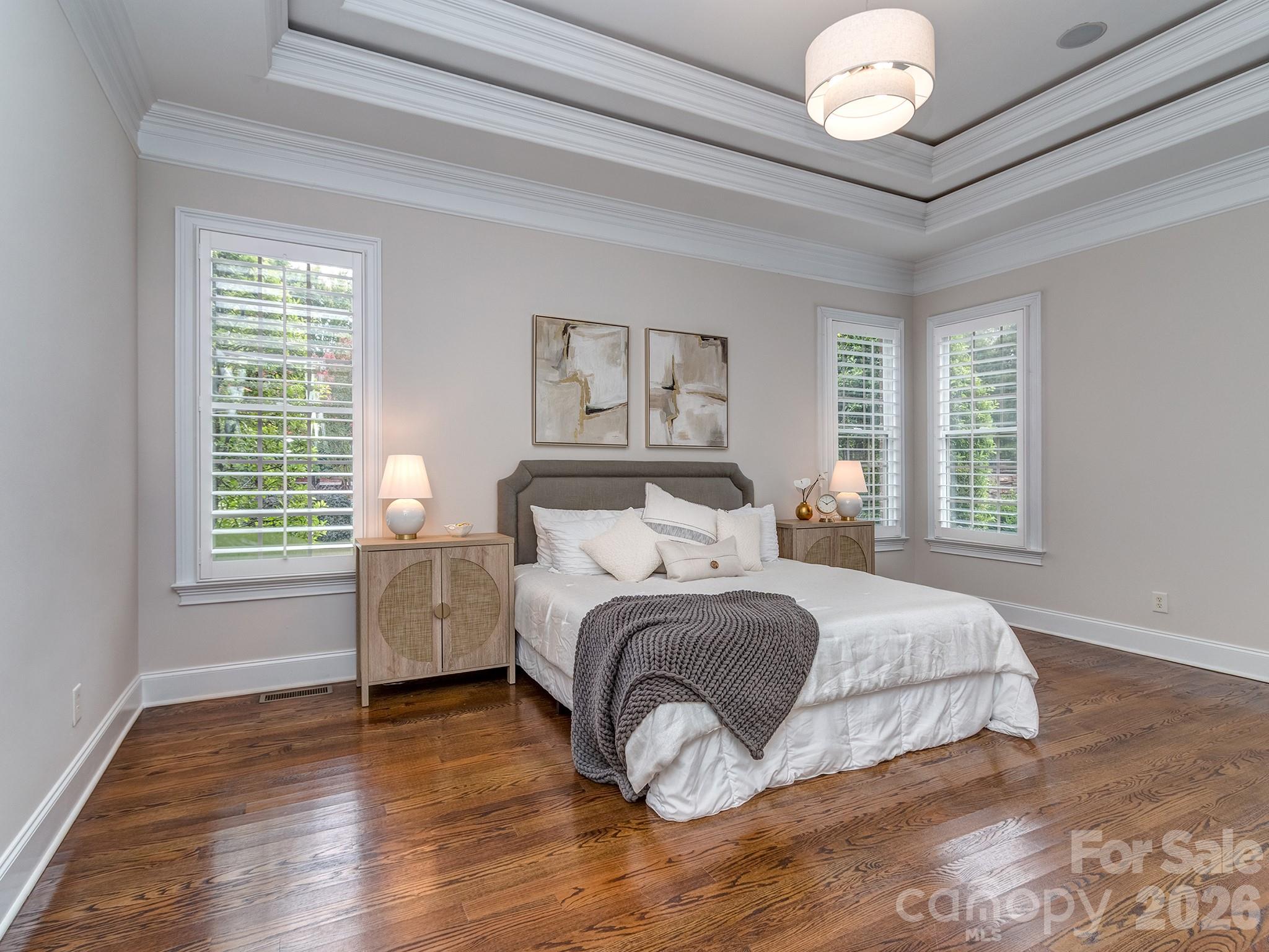 8208 Wingard Road Waxhaw, NC 28173 - Photo 19 of 41 a spacious bedroom with a bed and a window