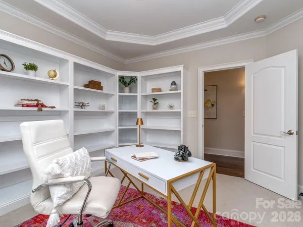 a room with a table and a workspace