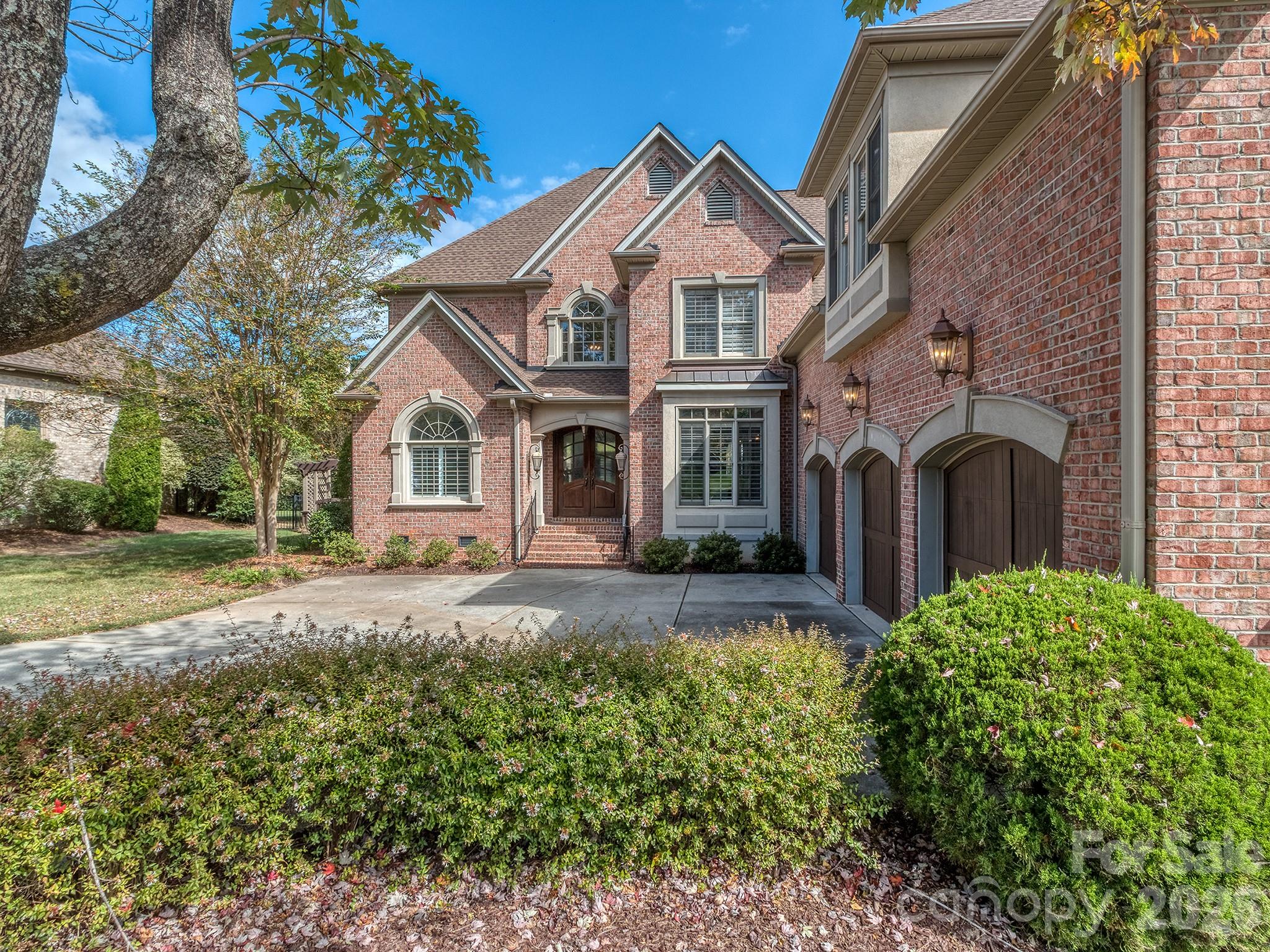 8208 Wingard Road Waxhaw, NC 28173 - Photo 37 of 41 a front view of a house with garden