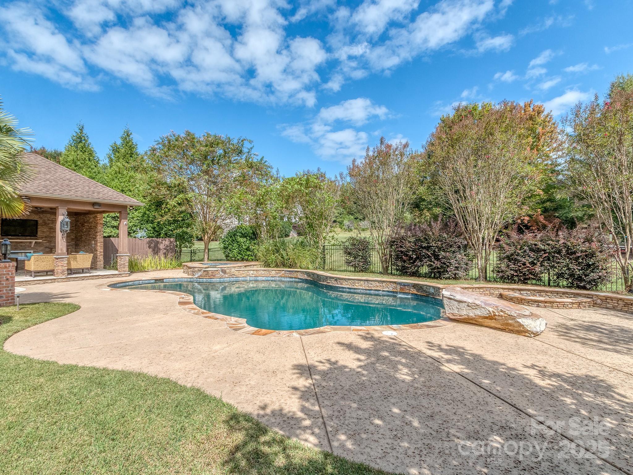 8208 Wingard Road Waxhaw, NC 28173 - Photo 41 of 41 a view of a swimming pool with a patio