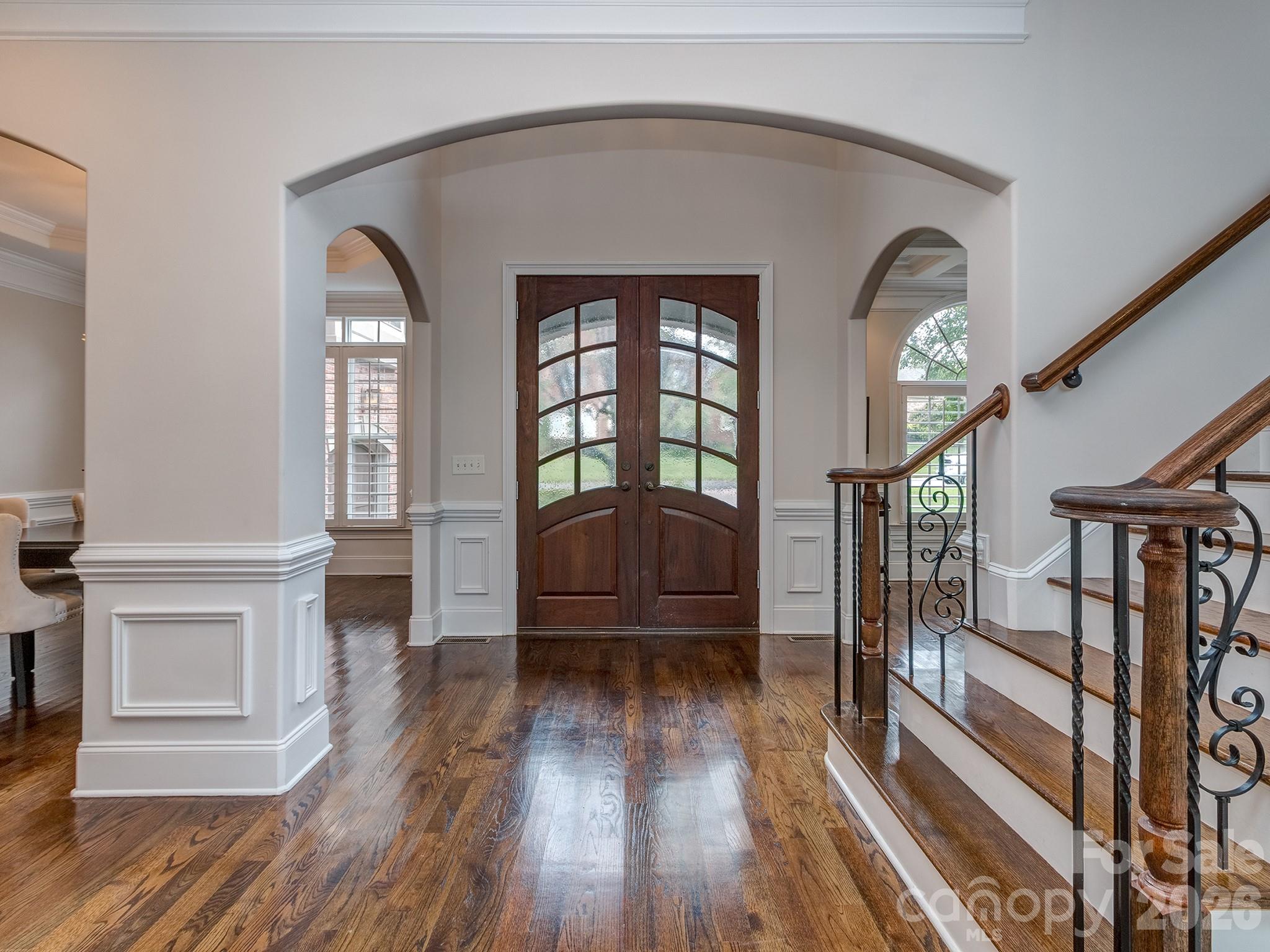 8208 Wingard Road Waxhaw, NC 28173 - Photo 7 of 41 a view of livingroom with hardwood floor and hallway