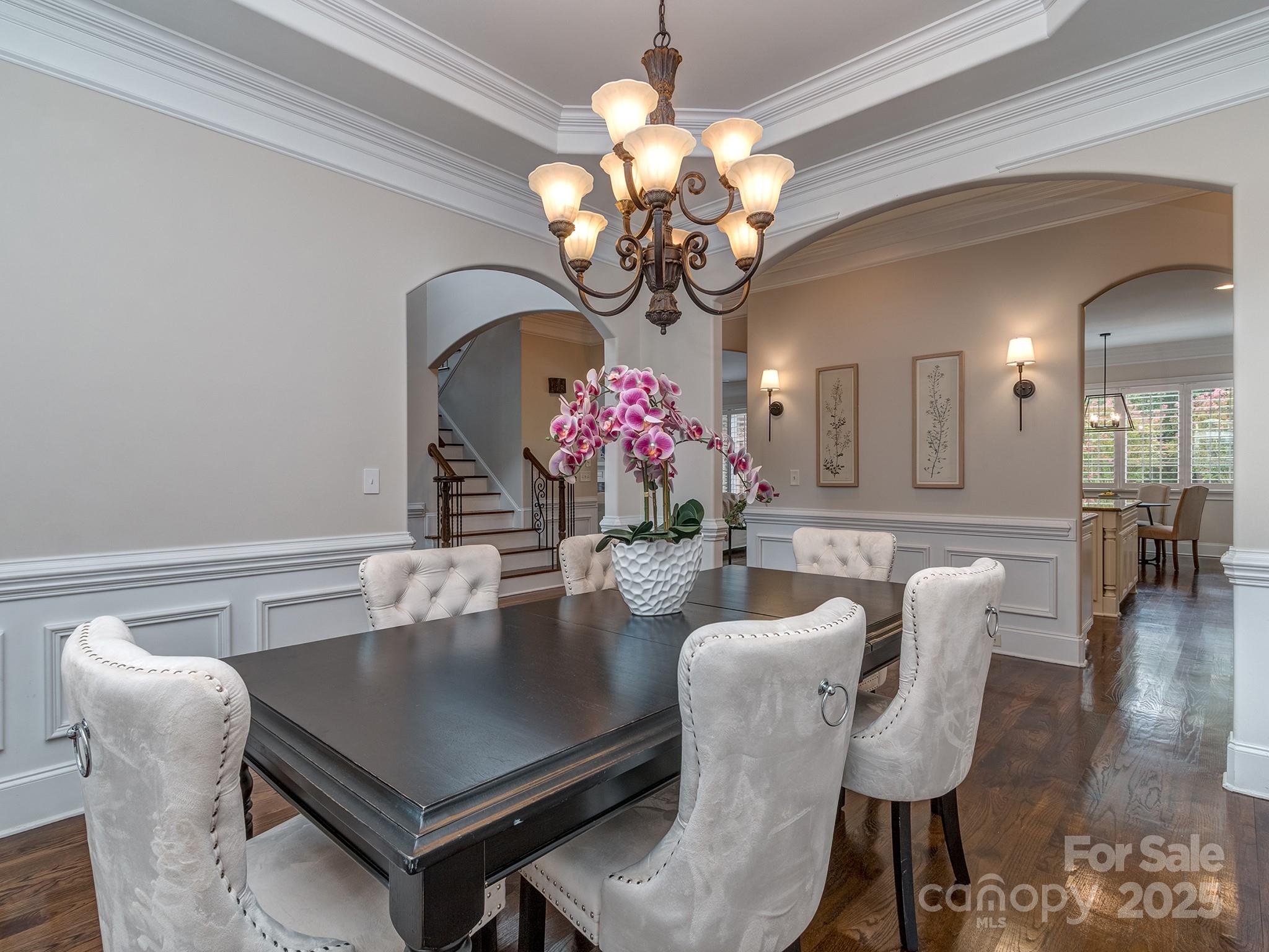8208 Wingard Road Waxhaw, NC 28173 - Photo 10 of 41 a dining room with furniture and chandelier