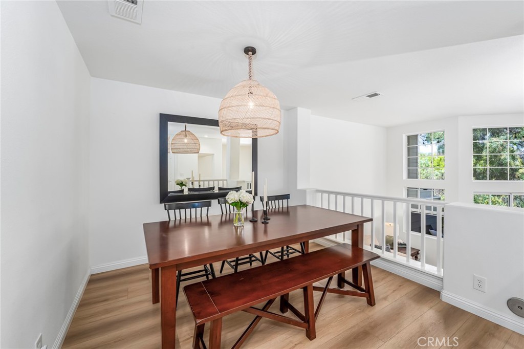 33144 Ocean Ridge Dana Point, CA 92629 - Photo 15 of 45 a dining room with furniture and window