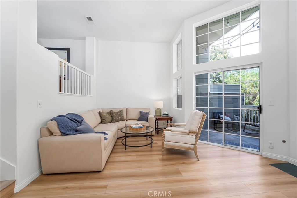 33144 Ocean Ridge Dana Point, CA 92629 - Photo 19 of 45 a living room with furniture and a window