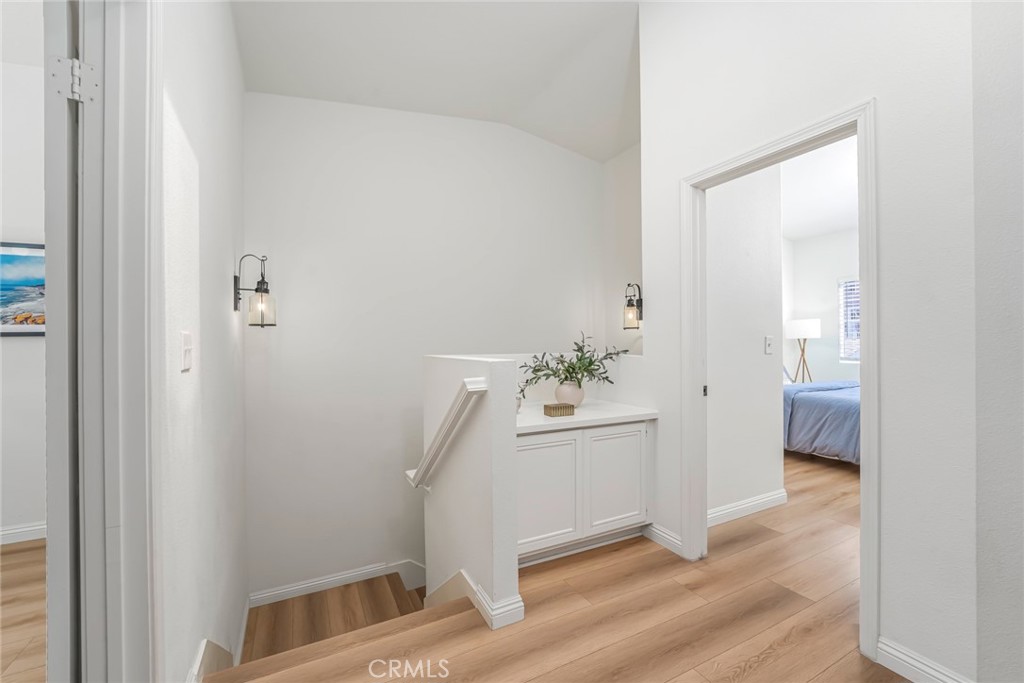 33144 Ocean Ridge Dana Point, CA 92629 - Photo 24 of 45 a view of an entryway with wooden floor
