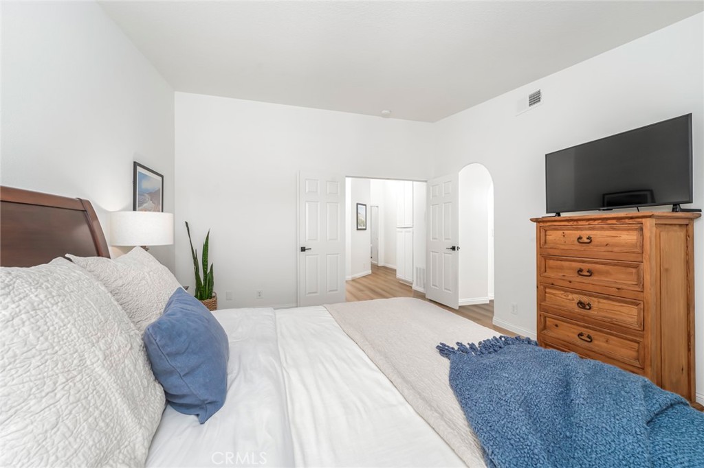33144 Ocean Ridge Dana Point, CA 92629 - Photo 26 of 45 a bedroom with a bed and a television
