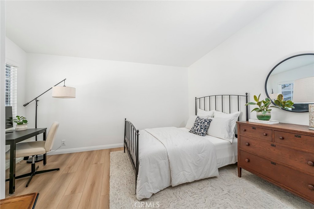 33144 Ocean Ridge Dana Point, CA 92629 - Photo 29 of 45 a bedroom with a bed and a dresser