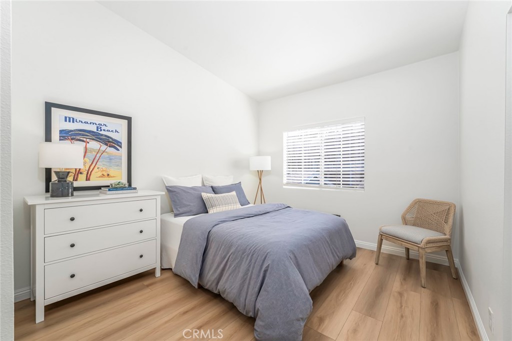 33144 Ocean Ridge Dana Point, CA 92629 - Photo 32 of 45 a bedroom with a bed and a dresser