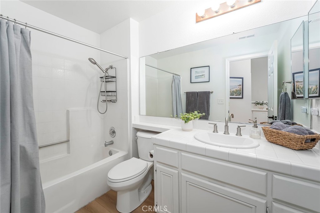 33144 Ocean Ridge Dana Point, CA 92629 - Photo 34 of 45 a bathroom with a sink a toilet and shower