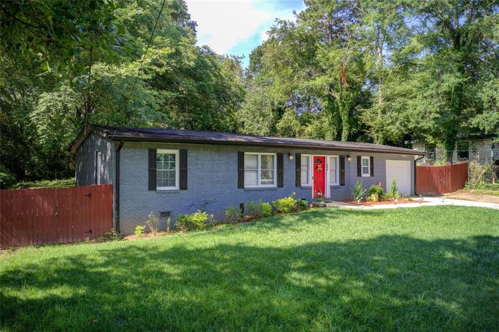 2619 Old Toney Road Ellenwood, GA 30294 - Photo 2 of 32 a view of a house with a yard and sitting area