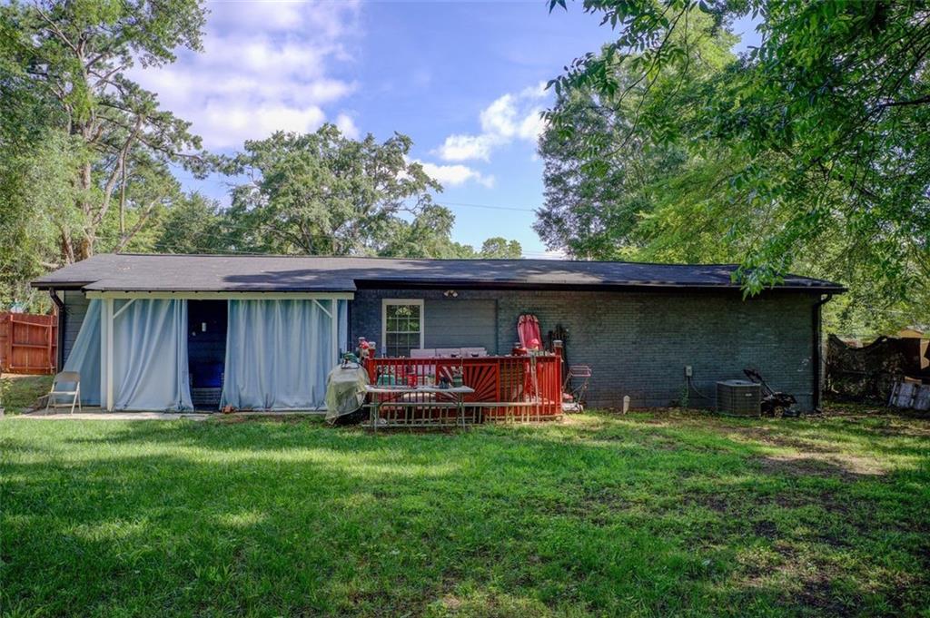 2619 Old Toney Road Ellenwood, GA 30294 - Photo 27 of 32 a front view of house with yard and outdoor seating