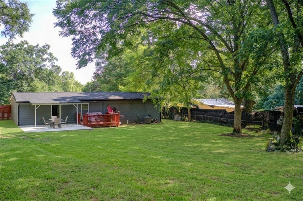 2619 Old Toney Road Ellenwood, GA 30294 - Photo 28 of 32 a view of a house with a yard and sitting area