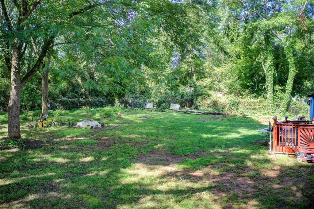 2619 Old Toney Road Ellenwood, GA 30294 - Photo 29 of 32 a view of green field with trees in the background