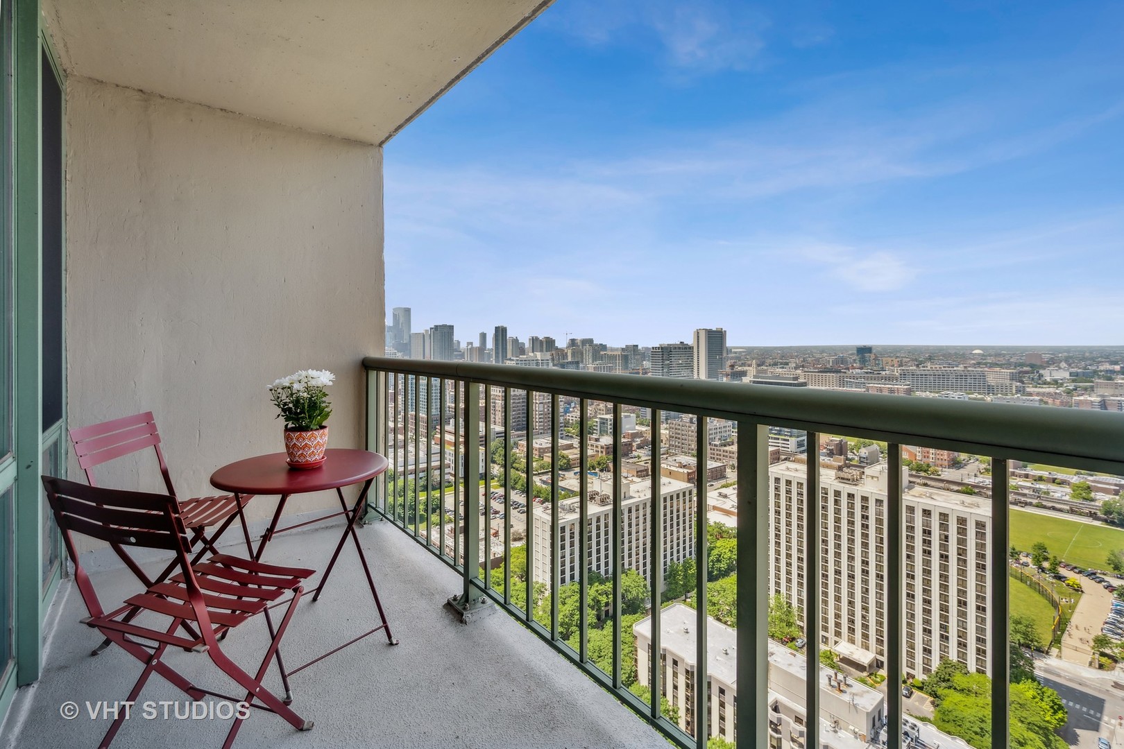 111 West Maple Street, Unit 3011 Chicago, IL 60610 - Photo 9 of 11 a view of a balcony with furniture