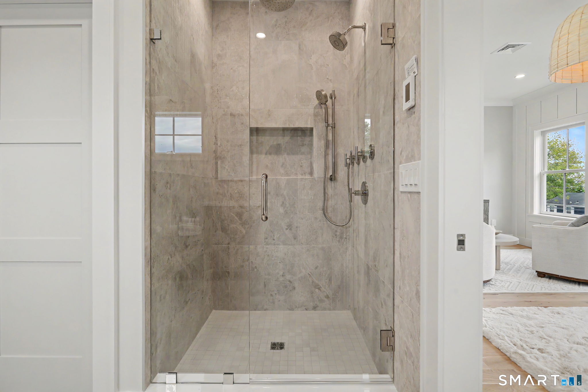 96 Clinton Street Fairfield, CT 06824 - Photo 22 of 34 a bathroom with a granite countertop shower mirror and a sink